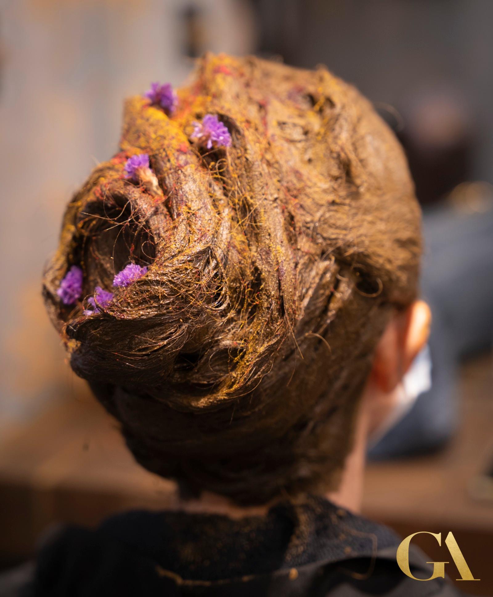Herbal hair spa treatment with organic turmeric and botanical ingredients at GA Salons London
