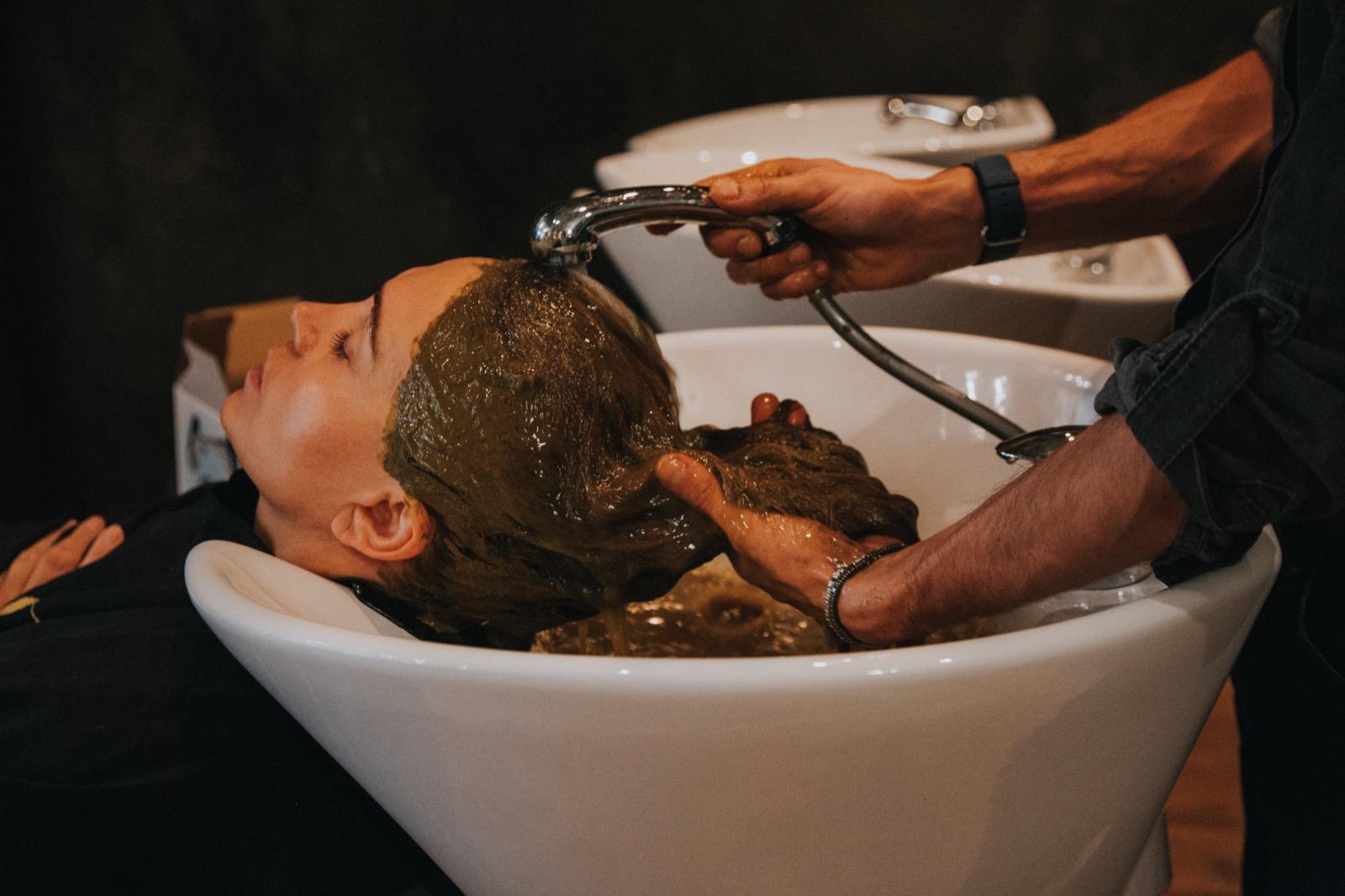 Organic hair colour treatment with natural herbal mixture being applied at GA Salons London
